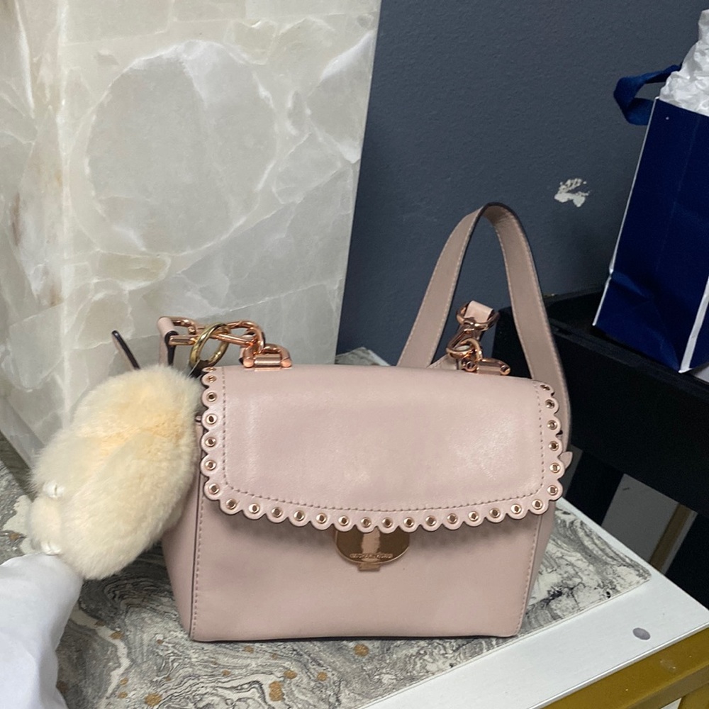 Cross body pastel pink hand bag